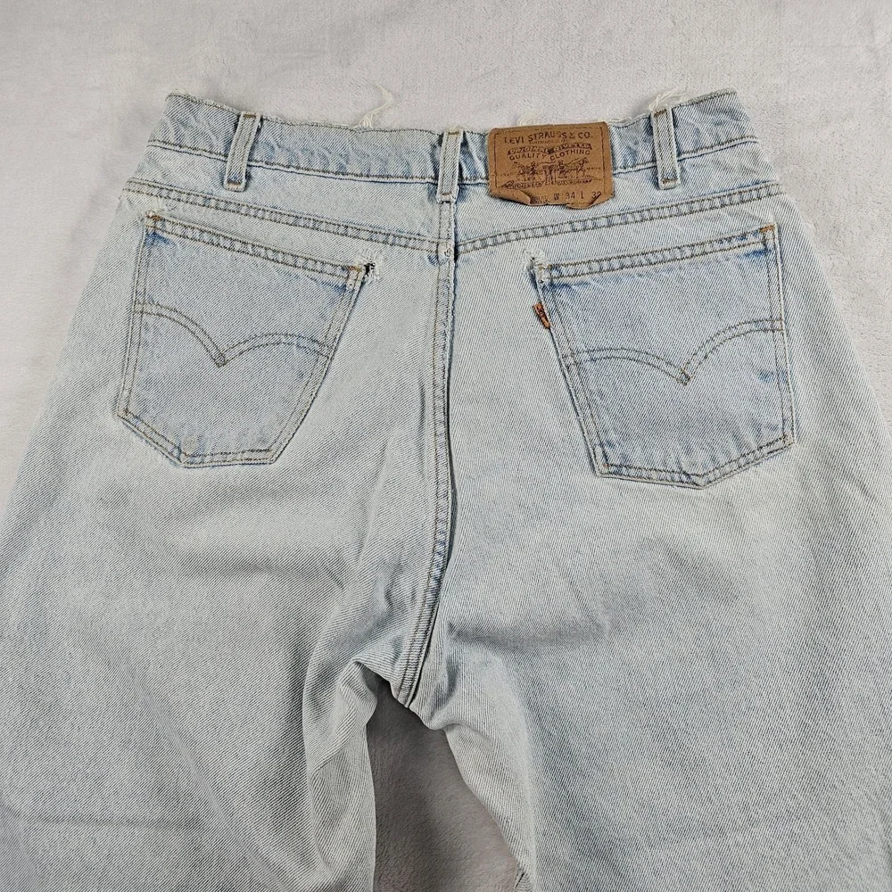 Vtg Levi's 560 Orange Tab Jeans 34x29 90s USA Loose Tapered Light Wash Raw Hem